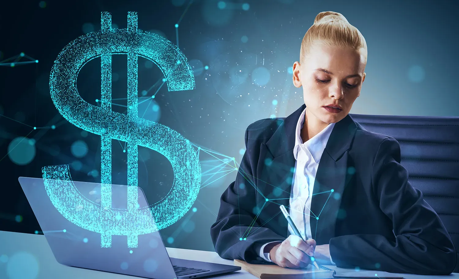 Woman sitting at a desk laking notes